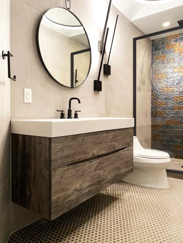 Sleek modern bathroom design featuring a stylish vanity, neutral tones, and elegant fixtures.