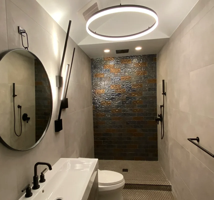 Contemporary bathroom design featuring minimalist elements and a striking accent wall.