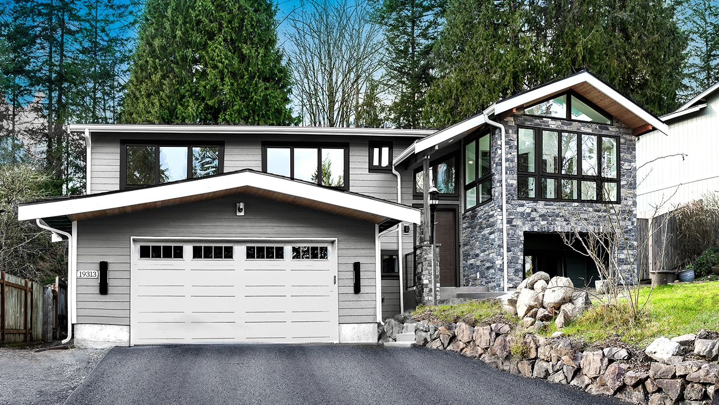 Skilled remodeling contractors in Bellevue collaborating on a high-end home renovation project.