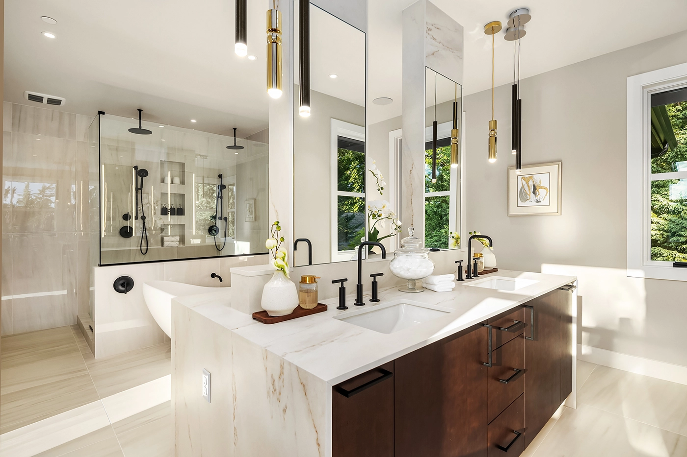 Spa-like master bathroom remodel by Medina design build firm featuring dual marble vanity, glass walk-in shower with black fixtures, pendant lighting - ARIID Build & Remodel design build construction services