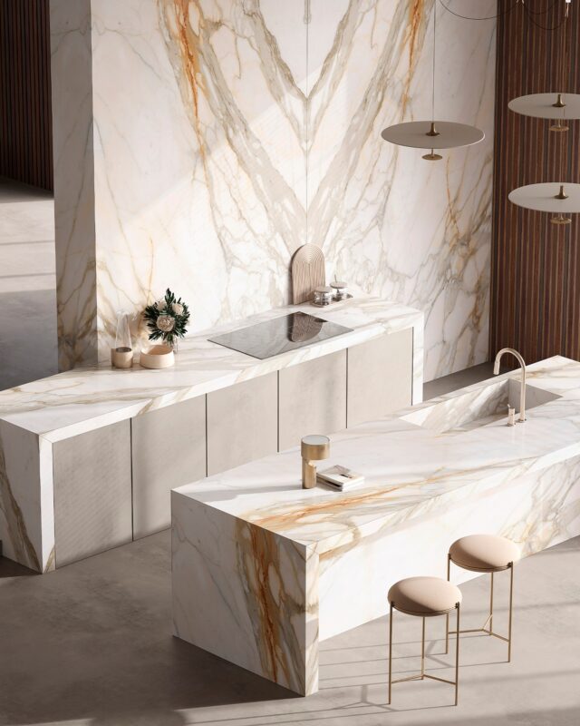 Modern luxury kitchen renovation with updated cabinetry and marble countertops in Bellevue home