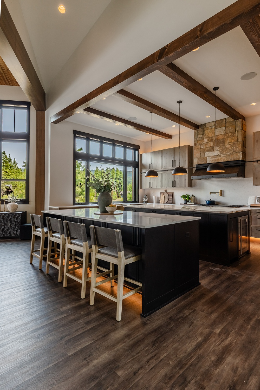 Open-concept kitchen remodel featuring custom island design and premium lighting by ARIID Build & Remodel
